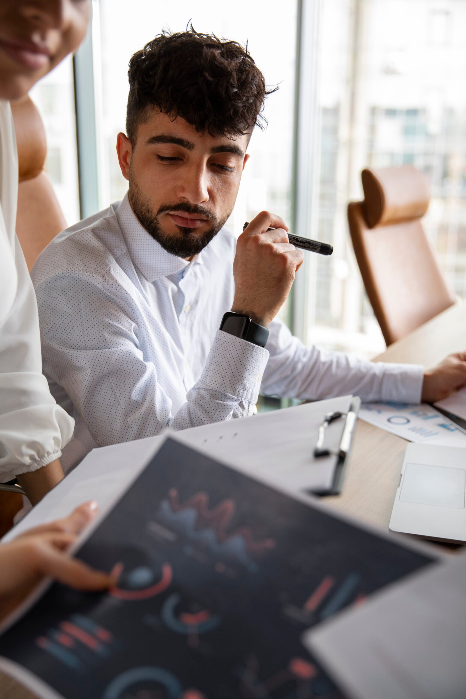 office-workers-using-finance-graphs office-workers-using-finance-graphs